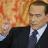 Italy's former Prime Minister Silvio Berlusconi gestures as he speaks during a news conference at Villa Gernetto in Gerno