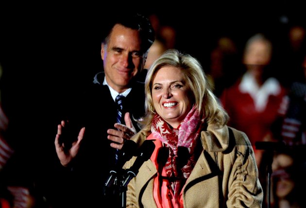 Republican presidential candidate, former Massachusetts Gov. Mitt Romney, left, looks on as wife Ann introduces him at a campaign event at the Comfort Dental Amphitheater, Saturday, Nov. 3, 2012, in Englewood, Colo. (AP Photo/David Goldman)