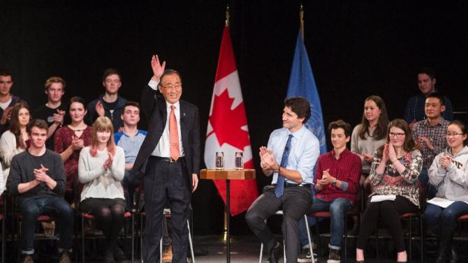 Canadian Prime Minister Justin Trudeau (R) participates in a student assembly with United Nations Secretary-General Ban Ki-moon at Glebe Collegiate Institute in Ottawa, Ontario on February 11, 2016