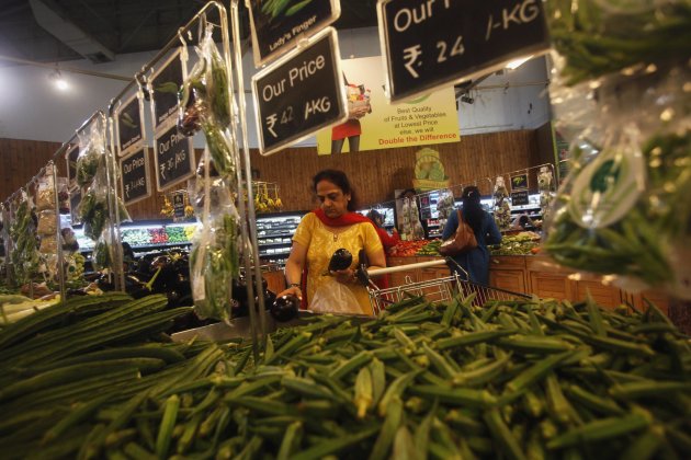 Customers shop inside a HyperCity supermarket in Mumbai