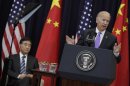 Vice President Joe Biden speaks next to Chinese Vice Premier Wang Yang at the State Department in Washington