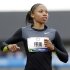 Allyson Felix finishes her heat in the women's 200 meters at the U.S. Olympic Track and Field Trials Thursday, June 28, 2012, in Eugene, Ore. (AP Photo/Eric Gay)