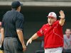 North Carolina State head coach Elliott Avent, right, argues with the umpire during the 10th inning of an NCAA college baseball tournament super regional game against Rice, Sunday, June 9, 2013, in Raleigh, N.C. (AP Photo/Karl B DeBlaker)