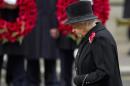 Britain's Queen Elizabeth II bows her head as she leads the Remembrance Sunday ceremony at the Cenotaph on Whitehall, London, on November 9, 2014