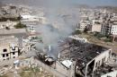Smoke rises from community hall where Saudi-led warplanes struck funeral in Sanaa the capital of Yemen