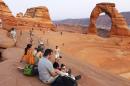 Tourists gather at the Arches National Park in Moab, Utah in this file photo