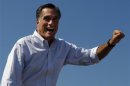 Republican presidential nominee Romney waves to the crowd at a campaign rally in Abingdon