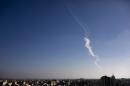 Rockets are fired from Gaza Strip towards Israel, Thursday, July 31, 2014, as international efforts to end the 23-day-old conflict seemed to sputter despite concern over the mounting death toll. (AP Photo/Dusan Vranic)