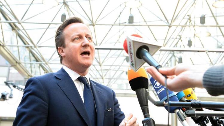 Prime Minister David Cameron speaks to journalists at the European Union Council building in Brussels, on March 6, 2014, before a meeting on the crisis in Ukraine