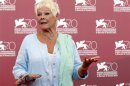 Actress Dench poses during a photocall for the movie "Philomena", directed by Stephen Frears, during the 70th Venice Film Festival in Venice