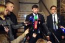 Representatives of self-proclaimed Donetsk and Luhansk People's Republics, Denis Pushilin (C) and Vladislav Deinego (R) talk to the press after a talk on resolving the Ukranian conflict on May 22, 2015 in Minsk