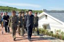North Korean leader Kim Jong-un is pictured during his inspection of the defence detachment on Jangjae Islet and the Hero Defence Detachment on Mu Islet
