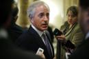 Corker speaks with reporters after Democratic and Republican party policy luncheons at the U.S. Capitol in Washington