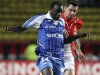 Auxerre's Dennis Oliech challenges Monaco's Thomas Mangani during their French Ligue 1 soccer match in Monaco