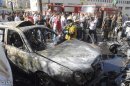 A view shows the wreckage after a car bomb exploded in the Syrian capital Damascus