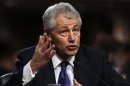 Former U.S. Senator Hagel testifies during Senate Armed Services Committee hearing on his nomination to be Defense Secretary, on Capitol Hill in Washington