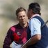 Poulter of England shakes hands with Van Pelt of the U.S. on the 17th hole after their second round match of the WGC-Accenture Match Play Championship golf tournament in Marana