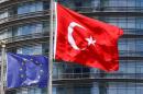 European Union and Turkish flags fly outside a hotel in Istanbul
