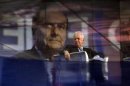 Mario Monti e sullo sfondo il segretario del Pd Pierluigi Bersani