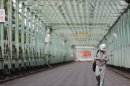 Man walks inside factory at Keihin industrial zone in Kawasaki, south of Tokyo