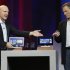 Microsoft CEO Steve Ballmer, left, and Qualcomm CEO Paul Jacobs talk about various Windows based products that utilize Qualcomm technology during Jacobs' keynote address at the Consumer Electronics Show, Monday, Jan. 7, 2013, in Las Vegas. (AP Photo/Julie Jacobson)