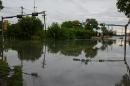An intersection is flooded near the headwaters of the San Marcos River that flooded in San Marcos Texas