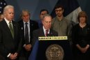 New York City Mayor Bloomberg is joined by U.S. Vice President Biden and family members of victims of Sandy Hook school shooting during a news conference in New York