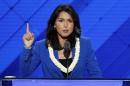 FILE - In this July 26, 2016, file photo, Rep. Tulsi Gabbard, D-Hawaii, speaks at the Democratic National Convention in Philadelphia. Gabbard says she met with Syrian President Bashar Assad during a recent trip to the war-torn country. Appearing on CNN, she says there is no possibility for a viable peace agreement in Syria unless Assad is part of the conversation. (AP Photo/J. Scott Applewhite, File)