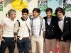 FILE - In this March 31, 2012 file photo, One Direction, from left, Niall Horan, Zayn Malik, Louis Tomlinson,  Liam Payne, and Harry Styles arrive at Nickelodeon's 25th Annual Kids' Choice Awards in Los Angeles. On Nov. 13, 2012, One Direction released its sophomore album, “Take Me Home,” which comes eight months after the boy band dropped its debut, “Up All Night,” which debuted at No. 1 and is platinum. (AP Photo/Chris Pizzello File)