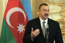 Azerbaijan's President Aliyev answers questions during a news conference in Prague