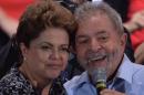 Brazilian President and presidential candidate for the Workers' Party (PT), Dilma Rousseff (L) and Brazilian former President Luiz Inacio Lula da Silva attend a campaign rally in Sao Paulo, Brazil, on October 20, 2014