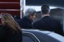 U.S. Secretary of State John Kerry boards his plane at Andrews Air Force Base, Md., en route to London in his inaugural official trip as Secretary on Sunday, Feb. 24, 2013. (AP Photo/Pool, Jacquelyn Martin)