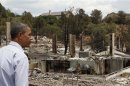 U.S. President Barack Obama surveys fire damaged homes in Colorado Springs
