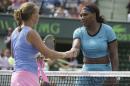 Serena Williams, right, shakes hands with Svetlana Kuznetsova, of Russia, left, after their match at the Miami Open tennis tournament, Monday, March 28, 2016, in Key Biscayne, Fla. Kuznetsova won 6-7 (3), 6-1, 6-2. (AP Photo/Lynne Sladky)