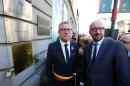 Brussels City mayor Yvan Mayeur (L) and Belgian Prime Minister Charles Michel (R) attend a tribute ceremony at the Jewish museum in Brussels on May 24, 2015