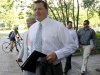 Former Major League Baseball pitcher Roger Clemens, accompanied by his attorney Rusty Hardin, left, arrives at federal court in Washington, Monday, June 11, 2012, for his perjury trial. (AP Photo/Haraz N. Ghanbari)