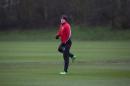 Manchester United's Wayne Rooney trains with teammates at Carrington training ground in Manchester, Monday, Feb. 24, 2014. Manchester United will play Olympiakos in a Champions League first knockout round on Tuesday. (AP Photo/Jon Super)