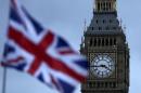 A Union flag flutters near the Houses of Parliament in London