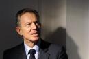 Britain's former Prime Minister Blair poses for a portrait following a Reuters Television interview in central London