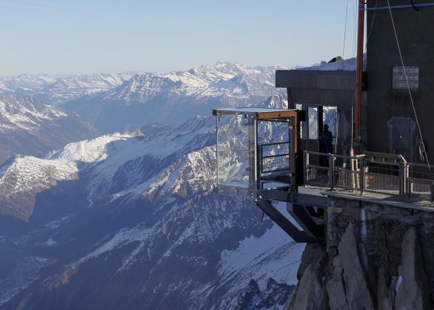 View of the &#39;Step into the Void&#39; installation at the Aiguille du Midi mountain peak above Chamonix, in the French Alps
