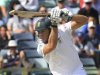 South Africa's du Plessis drives a ball from Australia's Johnson during the first day's play of the third cricket test match at the WACA in Perth