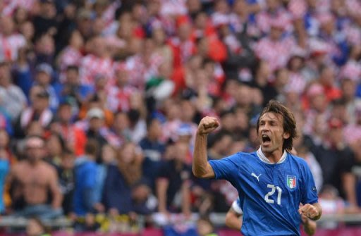 Italian midfielder Andrea Pirlo reacts after scoring