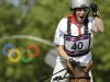 Zara Phillips, of Great Britain,  reacts after riding her horse High Kingdom in the equestrian eventing cross-country stage at the 2012 Summer Olympics, Monday, July 30, 2012, in London. (AP Photo/Charlie Riedel)