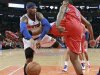 New York Knicks Carmelo Anthony tries to pass against Los Angeles Clippers DeAndre Jorda in NBA game in New York