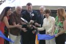 Gov. Jerry Brown, third from right and House Minority Leader Nancy Pelosi, second from right, joined California Democratic Party Chairman John Burton, second from left, in cutting the ribbon to open the new John L. Burton California Democratic Party Headquarters in Sacramento, Calif., Monday, June 16, 2014. Burton, who was elected party chairman in 2009, has severed in the House of Representatives, and both houses of the state Legislature. While in the Senate he served as Senate President Pro Tem before leaving office due to term limits. Also joining in where Burton's daughter, Kimiko Burton, left, Sacramento City Councilman Steve Hansen, third from left, and California Democratic Executive Director Shawnda Westly, far right.(AP Photo/Rich Pedroncelli)