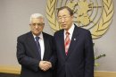 UN Secretary General Ban Ki-moon, right, shakes hands with Palestinian President Mahmoud Abbas at U.N. headquarters Wednesday, Nov. 28, 2012. (AP Photo/Frank Franklin II)