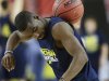 Michigan's Tim Hardaway Jr. works with a ball  during practice the NCAA Final Four tournament college basketball semifinal game against Syracuse, Friday, April 5, 2013, in Atlanta. Michigan plays Syracuse in a semifinal game on Saturday. (AP Photo/John Bazemore)