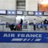 Passengers check-in at Air France desk in Nice International airport