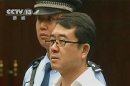 Still image of former police chief Wang attending a court hearing in Chengdu