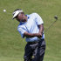 Vijay Singh, from Fiji, chips onto the second green during the first round of The Players championship golf tournament at TPC Sawgrass, Thursday, May 9, 2013, in Ponte Vedra Beach, Fla. (AP Photo/Chris O'Meara)